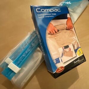 2 Compac Compression Bags with Blue Accents